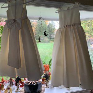 MonCheri, (2) Flower Girl Dresses (size 7 & 10) for 20.00